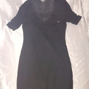 Bebe black ribbed dress with criss cross accents size small